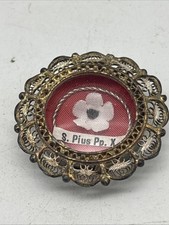 Reliquienkapsel, Messing